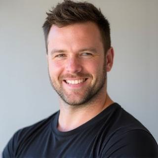 Headshot of Ben Carter, a professional Pilates instructor.